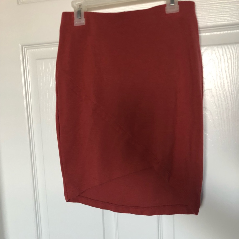 Burnt orange body con skirt with front little slit